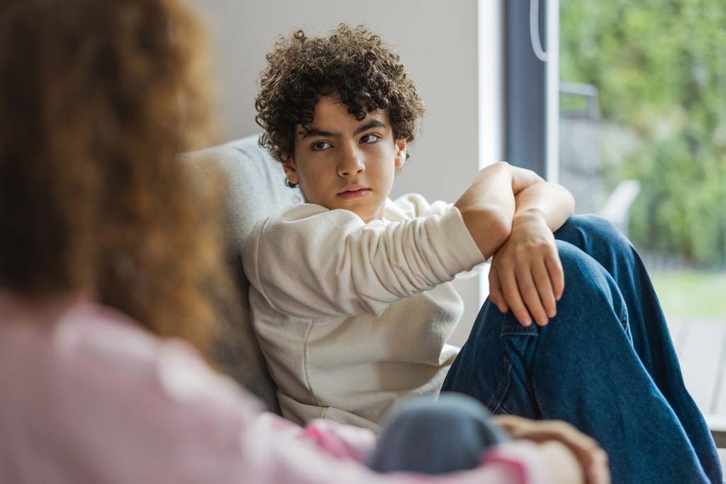 a parent and teen have a hard conversation